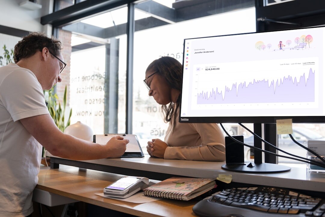 couple looking at investment charts