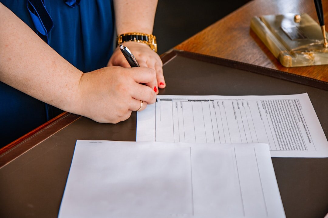 woman signing contract