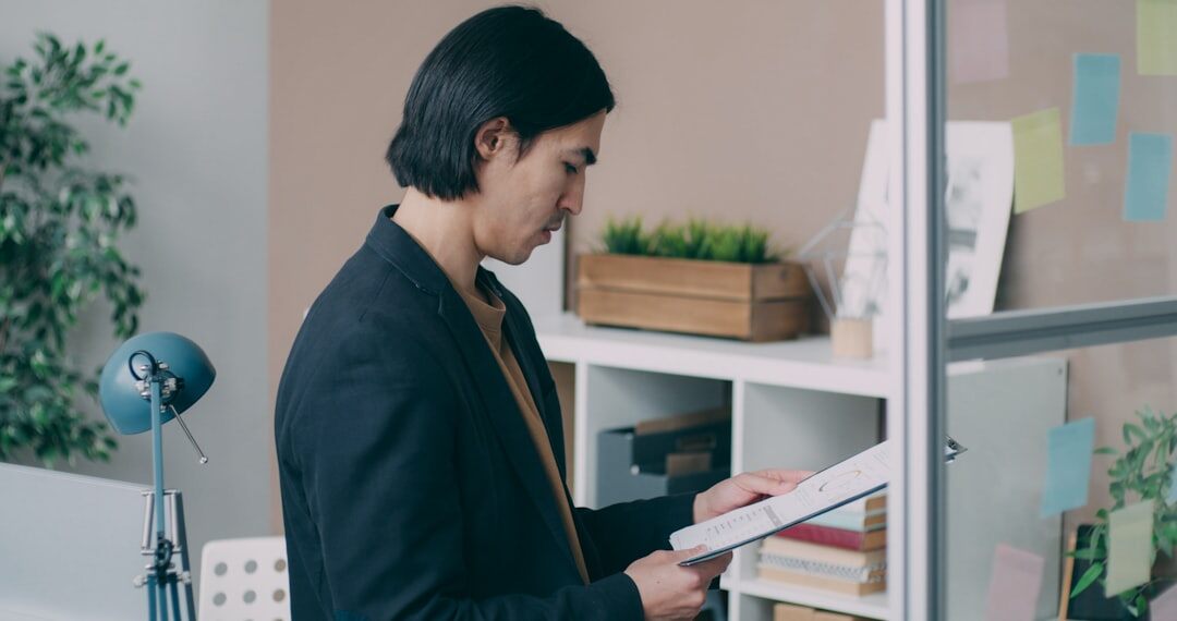 person reviewing documents