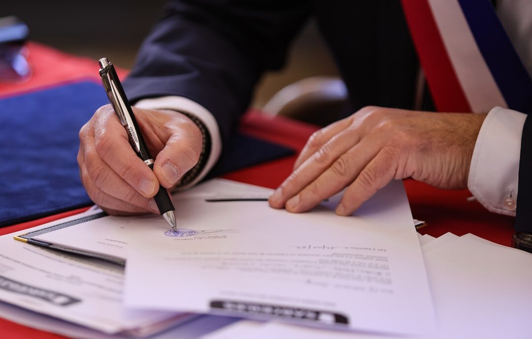 person signing insurance contract